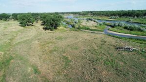 Acreage for sale in Nebraska with home by river near Hershey, Nebraska